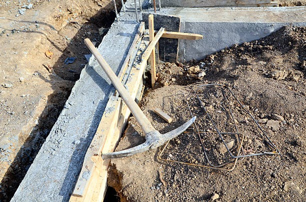 istock Fresh concrete in wooden concrete formwork 621370750