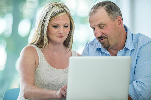 istock Couple Working on Their Annual Budget 621371280