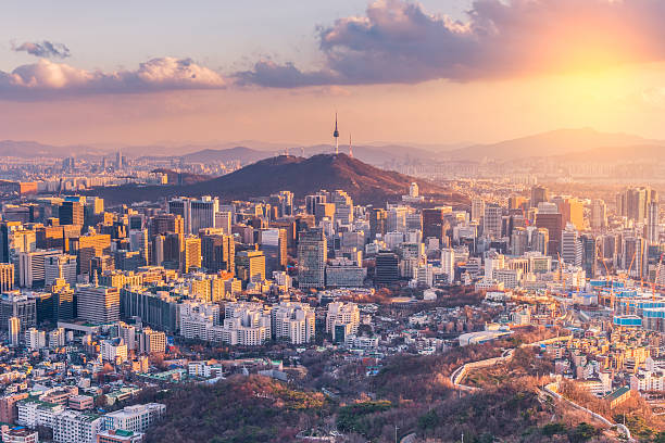 sunset at seoul city skyline,south korea. - korea stok fotoğraflar ve resimler