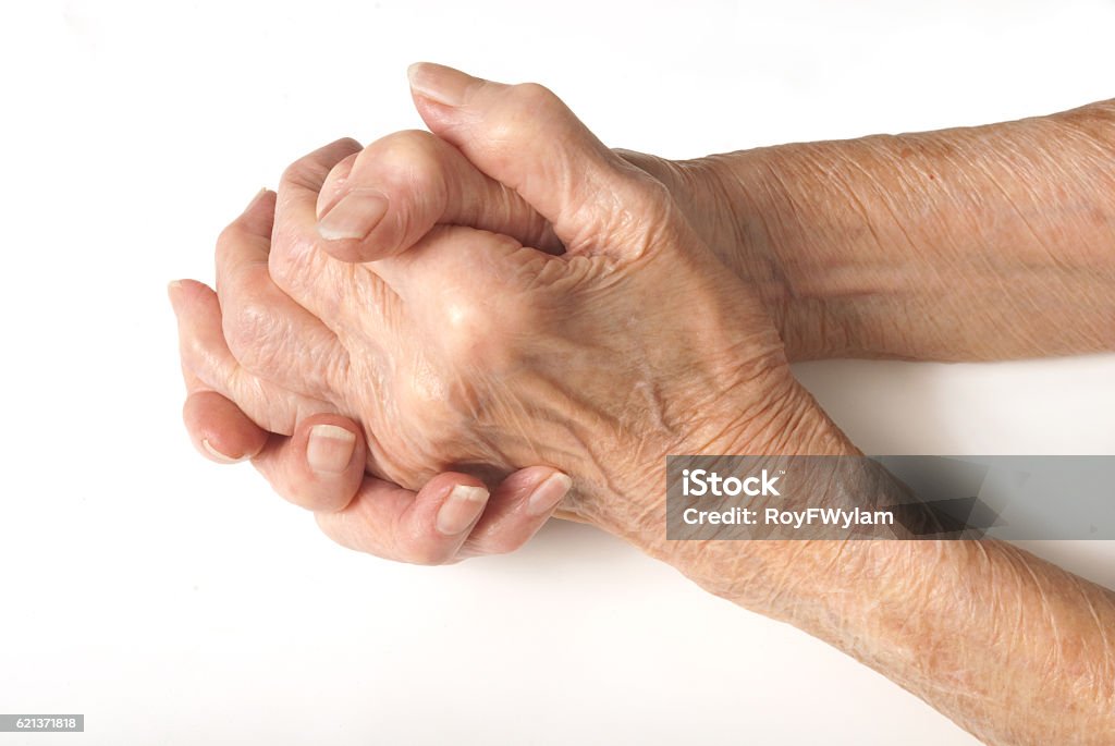 Old Lady's hands clasped My mother at 90 years old with arthritic hands Adult Stock Photo