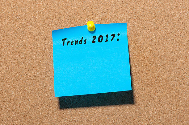 istock Trends 2017 written on blue sticker pinned at notice board 621373052