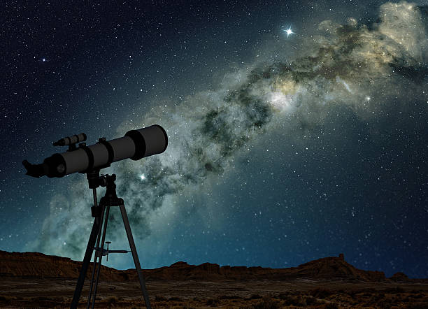 telescope pointing to the Milky Way stock photo