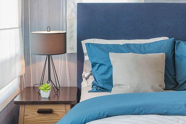 istock modern blue color tone bedroom with lamp 621375414
