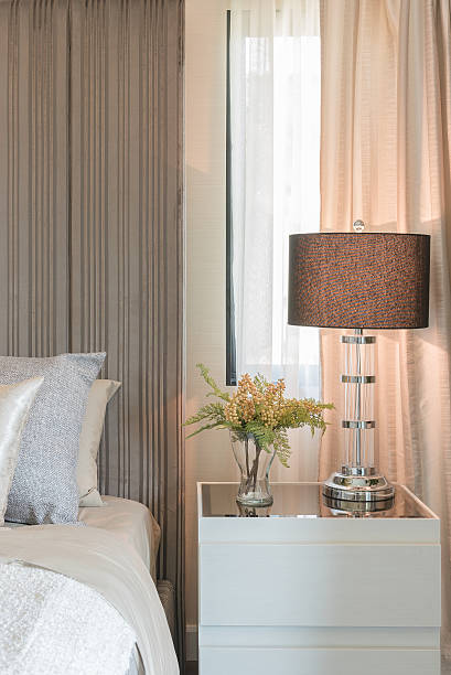 istock classic lamp style on white table side in bedroom 621376456