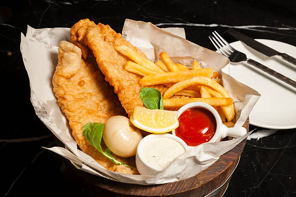 istock Fish and chips in bucket 621377716