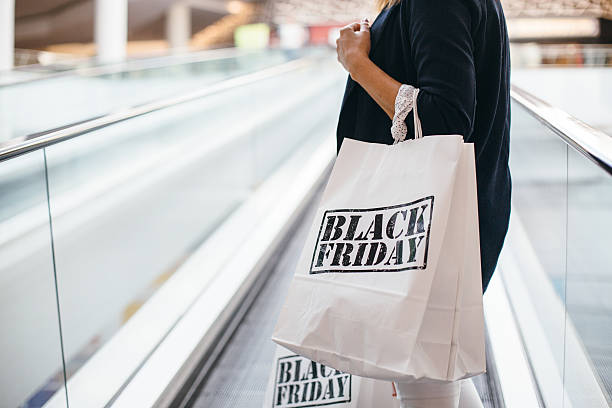 istock Person holding paper bags. 621378408