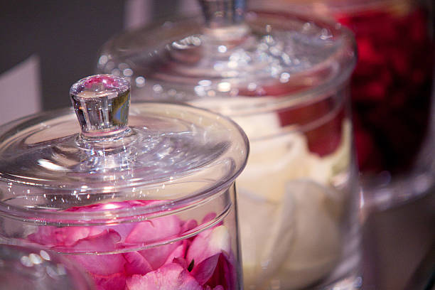 istock Rose petals in glass jars 621379070