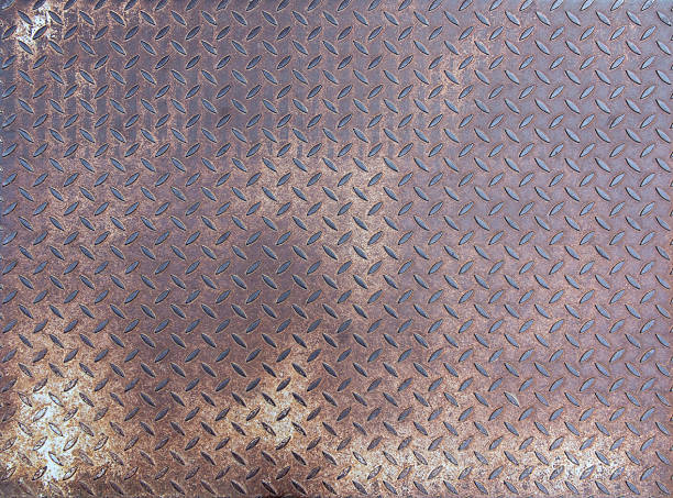 istock Diamond rusty steel plate - grunge texture 621379256
