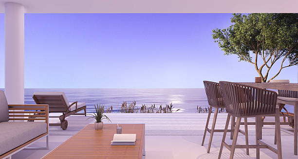 istock 3d rendering interior villa near sea in twilight scene 621384444