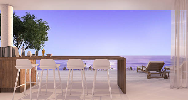istock 3d rendering dining bar in small villa near beautiful beach 621384526