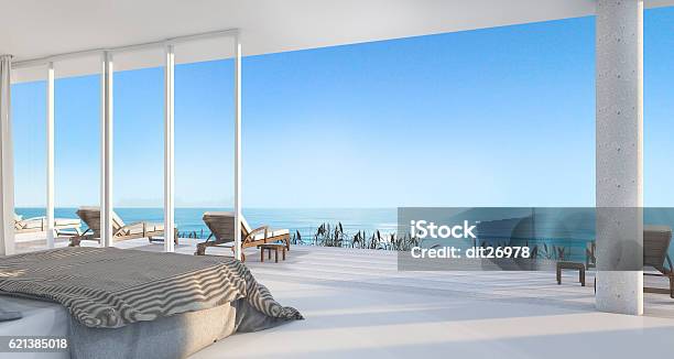 3d Rendering Luxury Villa Bedroom Near Beach Stock Photo - Download Image Now - Looking Through Window, Cityscape, Sea