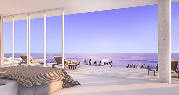 istock 3d rendering luxury villa bedroom near beach in evening 621385184