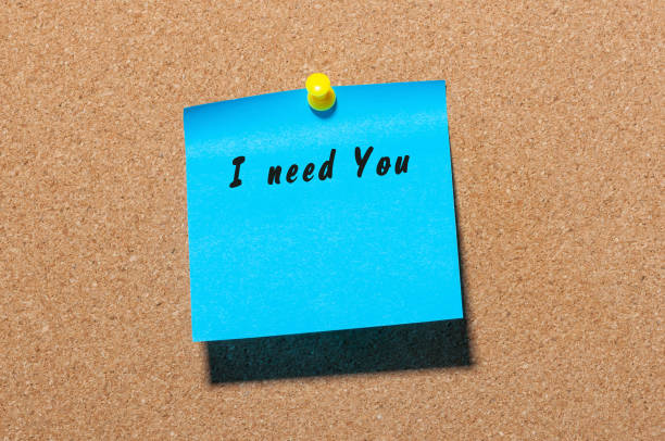 istock The phrase I need you written on blue sticker pinned 621386948