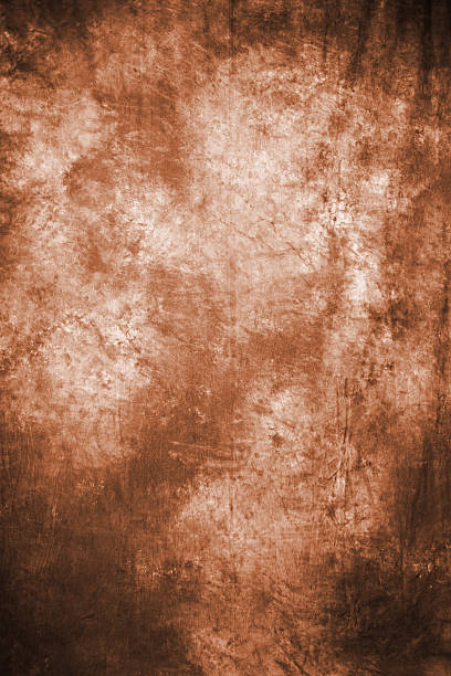 istock rusty mustard fabric artistic background with simulated blurred ink. 621387388