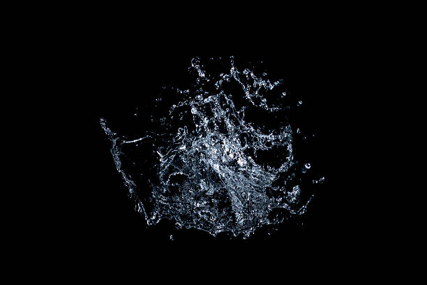 istock water splash. Isolated on black background 621388958