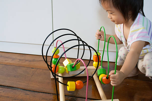 istock Baby is playing toy 621390858