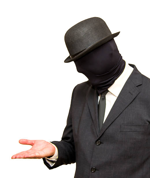 istock Businessman with his head hidden by a balaclava turned and 621391392
