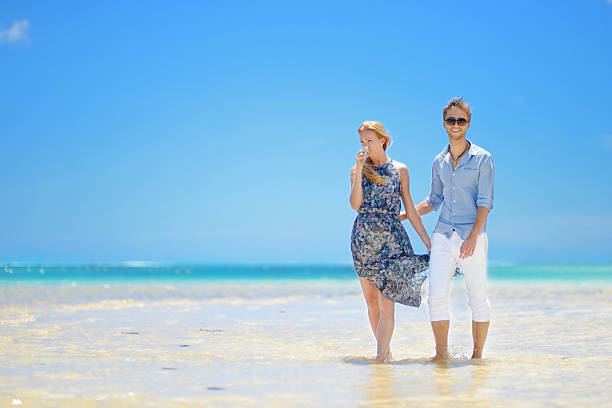 istock Young couple on a tropical island 621393298