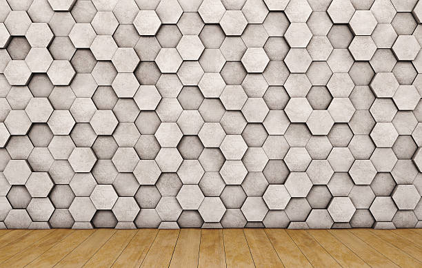istock Wall of concrete hexagons and wooden floor 621393502