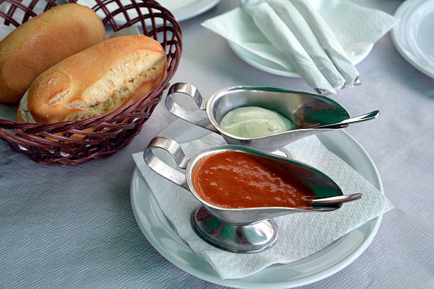 Pepper and alioli spanish sauce decorated on a restaurant table