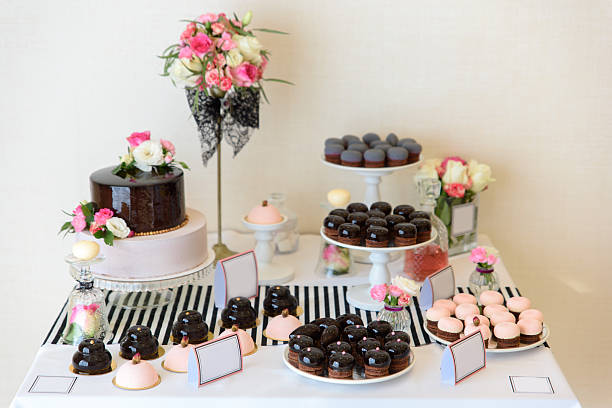 istock Beautiful desserts, sweets and candy table at wedding reception ot 621394624