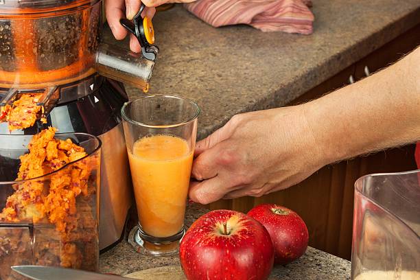 istock Production of fruit drinks. Healthy lifestyle. 621394816
