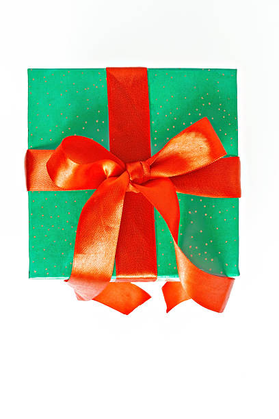 istock red and green Christmas gift with ribbon isolated 621395094
