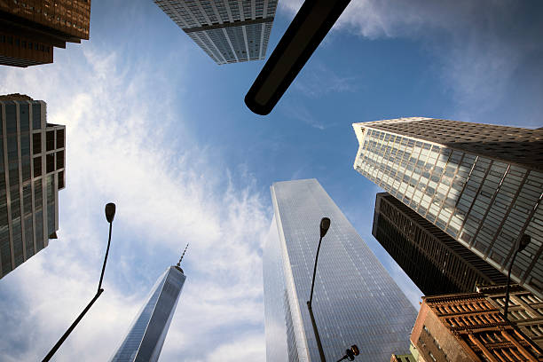 istock Low angle view of corporate office buildings against sky 621462850