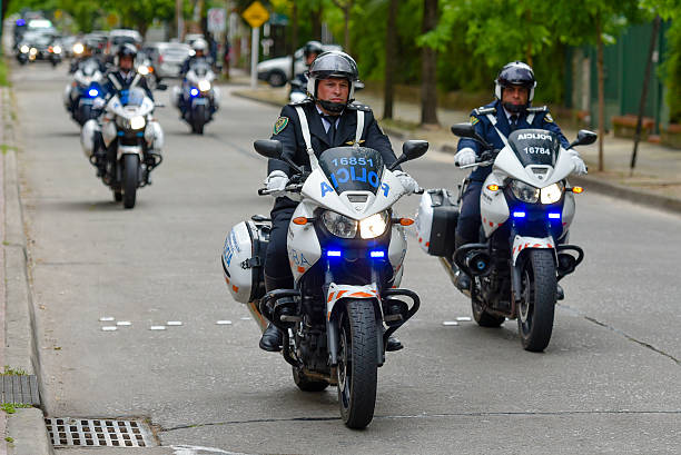 Police motorcycle escort stock photo