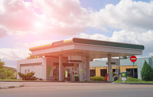 istock gas station in city 621465484