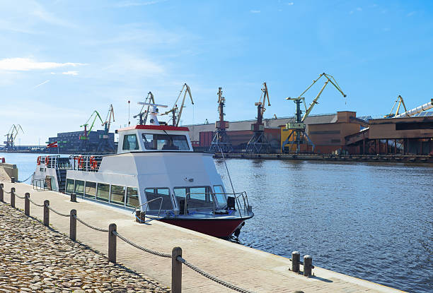 istock Excursion Ferry on Venta River in Ventspils in Latvia 621469836