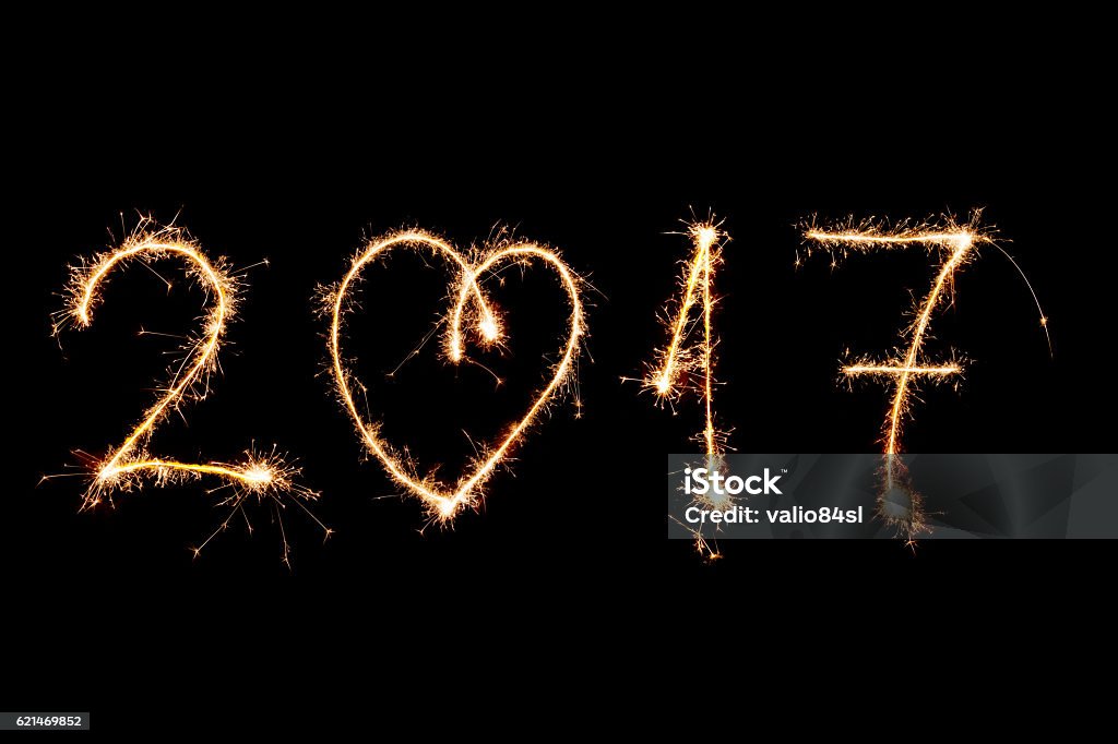 HAPPY NEW YEAR 2017 written with fireworks as a background 2016 Stock Photo