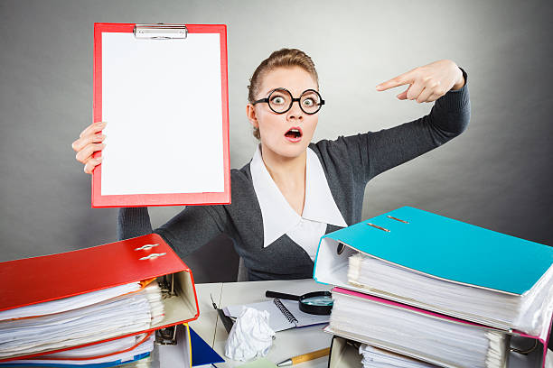 istock Elegant woman with empty clipboard. 621471710