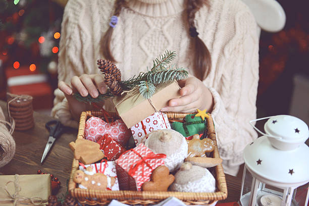 istock girl making Christmas presents 621472854
