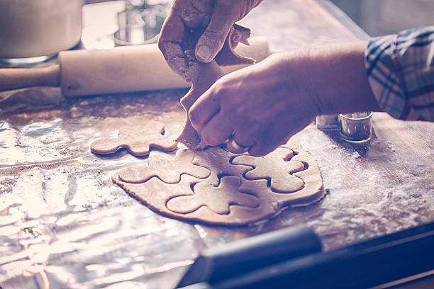istock Preparing Christmas Cookies in Domestic Kitchen 621473538