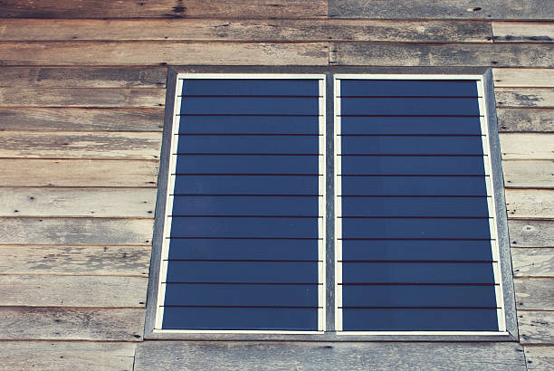 istock Vintage,old window with wood background 621476370