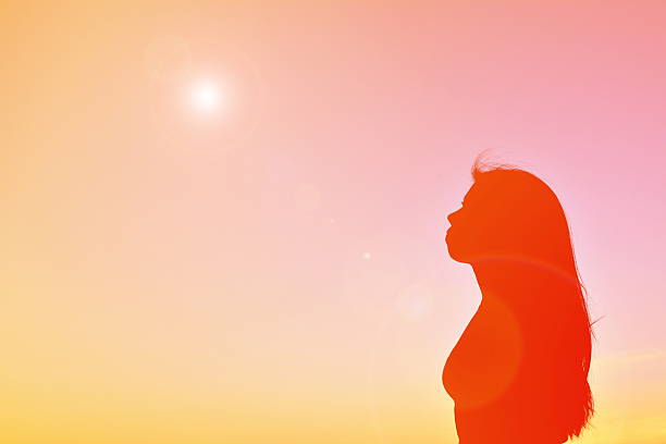 istock Silhouettes women playing at sunset 621478004