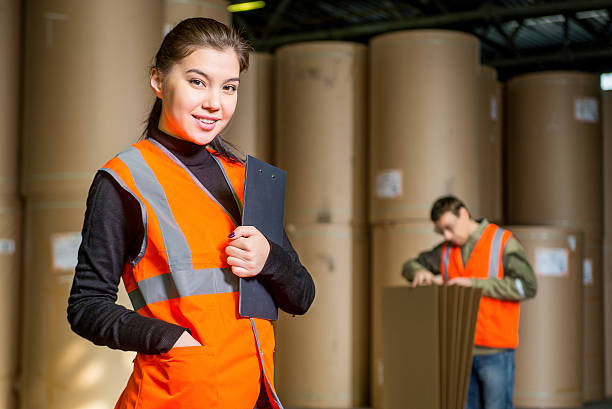 istock Paper mill factory workers 621481194