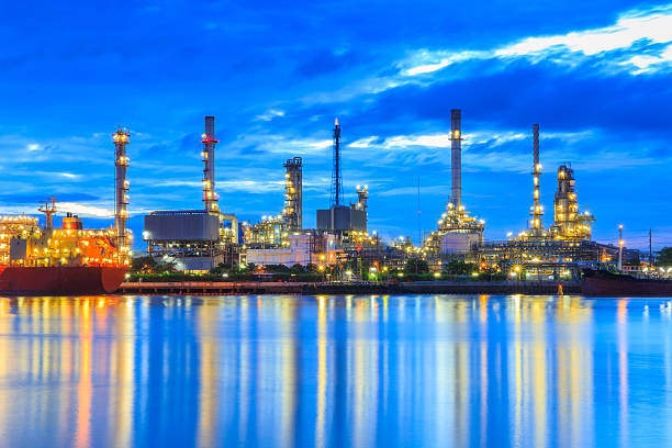 istock Oil refinery along the river at Dusk (Bangkok, Thailand) 621481788