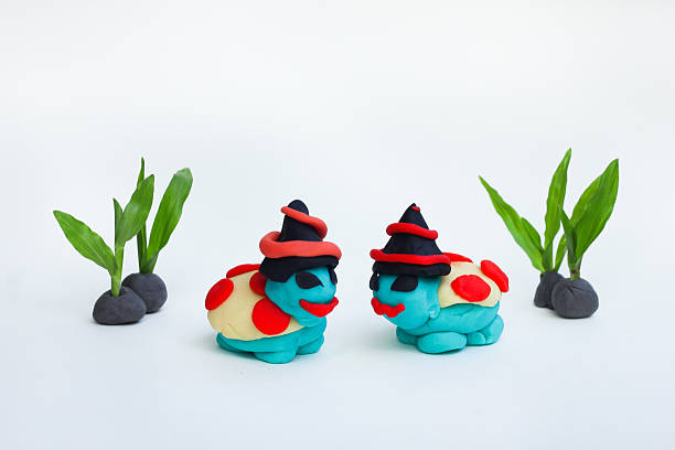 istock Dough molding a Halloween turtle on a white background. 621483718