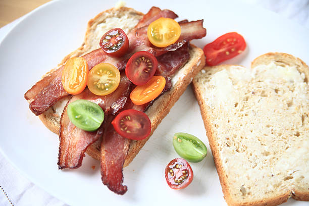 istock Overhead of bacon and cherry tomato sandwich 621484302