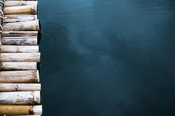 Close-up bamboo raft on the water