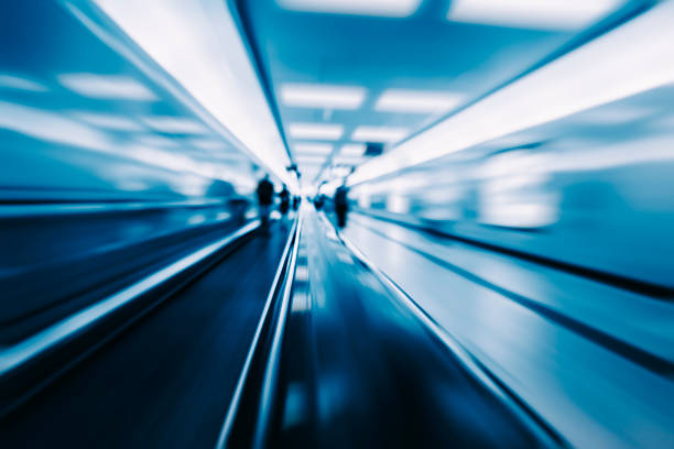 istock Moving blur travolator in airport 621487416