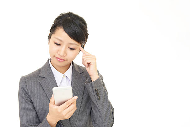 istock Business woman with a smart phone 621489902