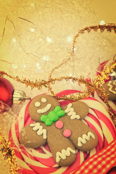 istock Gingerbread man  Christmas lollipop closeup 621493692