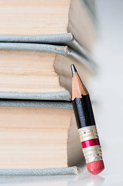 istock Old Books and Small Perfect Pencil 621493802