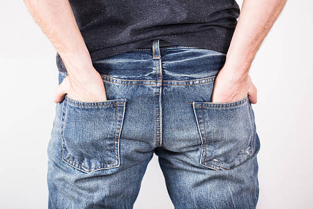 istock man with his hands in jeans pockets 621493936