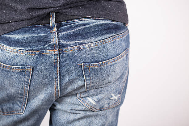 istock man with his hands in jeans pockets 621494068