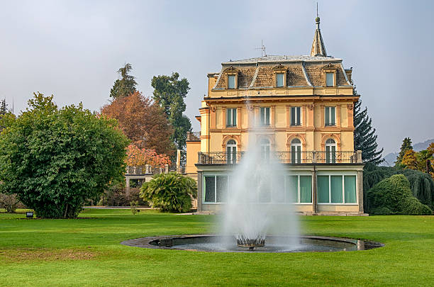 Italian garden in Autumn Verbania, Italy - October 31, 2016: Panoramic view of Idyllic botanical garden of Villa Taranto by Lago Maggiore during Fall, Verbania, Italy.  taranto stock pictures, royalty-free photos & images