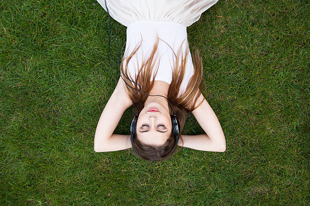 istock listening music background 621501098